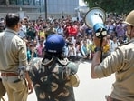 Security personnel in Noida on Monday. (Sunil Ghosh/HT)