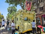 Mumbai: Workers decorate a vehicle with flowers for carrying the mortal remains of singing legend Asha Bhosle, in Mumbai, Maharashtra, Monday.(PTI)