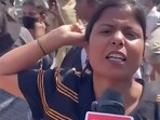 A factory worker during the wage-hike protest in Noida on Monday, April 13. The agitation, led largely by workers from the Hosiery Complex and other manufacturing units, has been driven by demands for wage parity with neighbouring Haryana and improved working conditions.