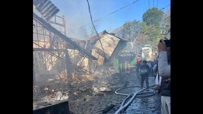 Firefighters took about five hours to douse the fire that broke out at the Heritage Market in Kasauli at 4am on Monday. (HT Photo) Firefighters took about five hours to douse the fire that broke out at the Heritage Market in Kasauli at 4am on Monday. (HT Photo)