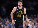 Los Angeles Lakers guard Luka Doncic (77) reacts after a play against the Oklahoma City Thunder during the second half at Paycom Center.(IMAGN IMAGES via Reuters Connect)