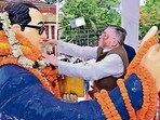 Jharkhand governor Santosh Gangwar and CM Hemant Soren pay tribute to Babasahed Ambedkar on his birth anniversary in Ranchi on Tuesday (HT PHOTO)