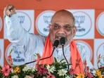 Union home minister Amit Shah addresses the gathering during an election campaign rally in support of BJP candidates ahead of West Bengal Assembly elections, at Kotasur in Birbhum district. Union home minister Amit Shah addresses the gathering during an election campaign rally in support of BJP candidates ahead of West Bengal Assembly elections, at Kotasur in Birbhum district.