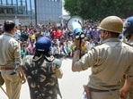 The protests were triggered by differences over a routine hike in minimum wages, which is linked to the Consumer Price Index (Industrial Workers).