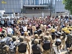 Security personnel deployed in Noida on Monday amid a massive factor workers' protest. Security personnel deployed in Noida on Monday amid a massive factor workers' protest.
