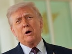 U.S. President Donald Trump speaks with the media after receiving a McDonald's order via DoorDash, on April 13, 2026.