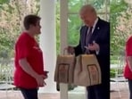 Trump receives McDonald’s delivery at White House to mark first anniversary of ‘no tax on tips’ law. 