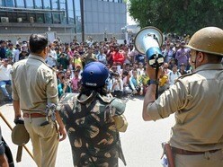 Security personnel in Noida on Monday. (Sunil Ghosh/HT)