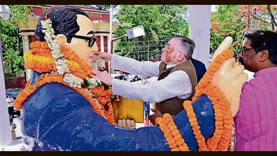 Jharkhand governor Santosh Gangwar and CM Hemant Soren pay tribute to Babasahed Ambedkar on his birth anniversary in Ranchi on Tuesday (HT PHOTO)