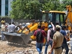During the demolition drive on Wednesday. (Parveen Kumar/HT)