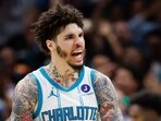 Charlotte Hornets guard LaMelo Ball celebrates after scoring against the Miami Heat 