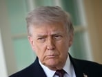 Donald Trump speaks to the press outside the Oval Office at the White House in Washington, DC on April 13.