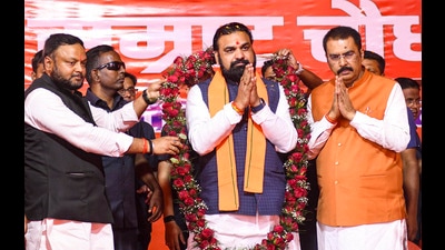 Bihar chief minister Samrat Choudhary, centre, being garlanded by state BJP president Sanjay Saraogi, right, and others during a felicitation ceremony at the party office in Patna on Wednesday. (PTI) Bihar chief minister Samrat Choudhary, centre, being garlanded by state BJP president Sanjay Saraogi, right, and others during a felicitation ceremony at the party office in Patna on Wednesday. (PTI)