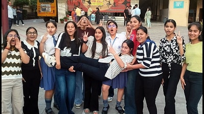 Students celebrating after the declaration of CBSE Class 10 results in Rohtak on Wednesday. (Manoj Dhaka/HT)