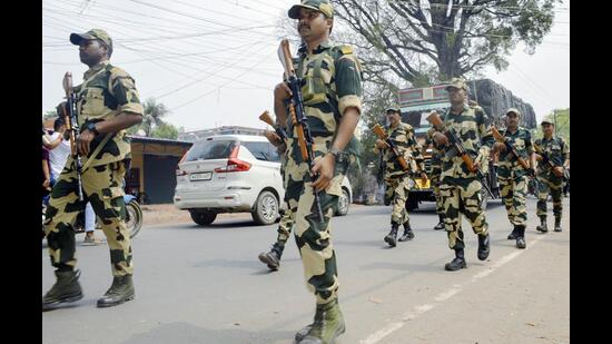 Personnel from the Central Armed Police Forces conduct a route march poll-bound West Bengal. (ANI)