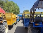 At Karnal’s new grain market on NH-44, farmer Veer Singh said he drove 32 km from Dachar village with his nephew to the mandi, where he waited three hours to get his gate pass issued. (HT Photo)