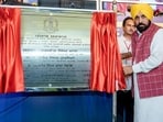 Chief minister Bhagwant Mann laying stone of development project in Tanda on Wednesday.Harpreet Kaur/HT Photo