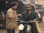 Aditya Dhar on the set of Dhurandhar with Ranveer Singh and Sara Arjun (hidden). 
