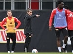 Marie-Louise Eta gestures as she speaks with players during a training session of 1 FC Union Berlin in Berlin on Tuesday. 