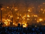 Firefighting operation was launched following a massive fire in a slum cluster in Lucknow’s Vikas Nagar area on Wednesday. (Deepak Gupta/HT Photo)