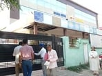 Officials from the Mohali administration sealing Sukh Seva Multi-Specialty Hospital in Kharar on Wednesday. (HT Photo)