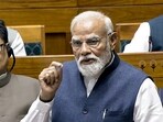 Prime Minister Narendra Modi speaks in the Lok Sabha during the Special session of Parliament, in New Delhi, Thursday