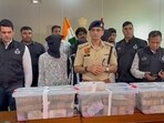 The arrested suspects in police custody. (HT)