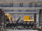 iiMumbai, India - April 15, 2026: A crane overturned during metro construction work on Tuesday at the Mumbai Metropolitan Region Development Authority site after a gear failure in the lifting boom caused the load to shift onto another crane, leading it to tilt, officials said following a preliminary inquiry; the affected road stretch is expected to reopen to traffic within 3–4 hours in Mumbai, India, on Wednesday, April 15, 2026. (Photo by Satish Bate/ Hindustan Times) (Hindustan Times)