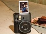 Capture moments and print them instantly with polaroid cameras