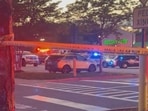 Police cars seen after the shooting at the Ashland Walmart. 