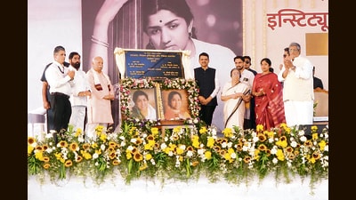 Chief Minister Devendra Fadnavis, Deputy Chief Minister Eknath Shinde, and RSS chief Mohan Bhagwat, among others, were present during the event at Lata-Asha Mangeshkar Institute of Medical Sciences (LMIMS) at Nandoshi , on Thursday. (HT )