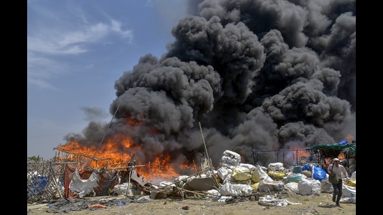 A majority of the population living here work as domestic-helps at high-rises in Indirapuram and nearby areas, while others work in scrap godowns for their livelihood. (Sakib Ali/HT Photo)