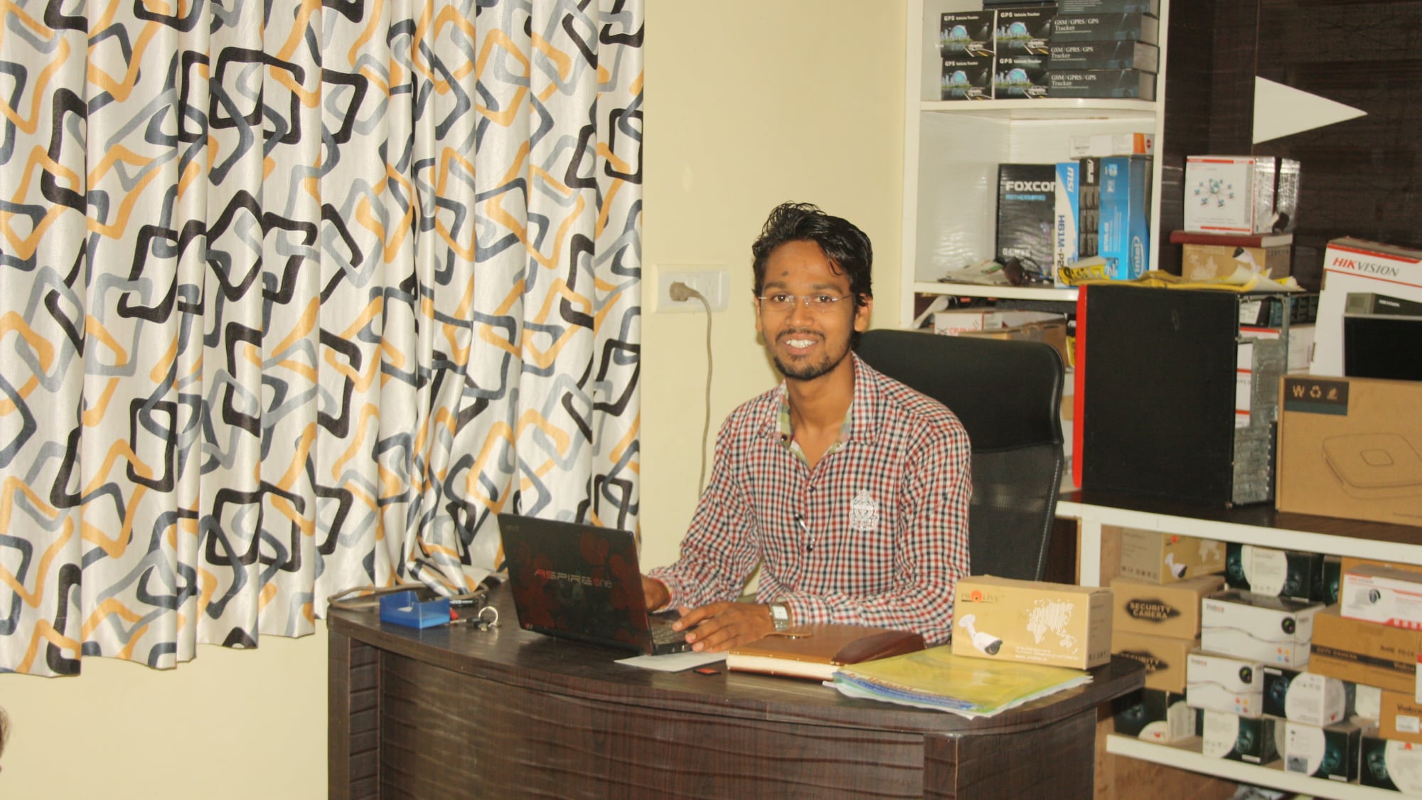 An old photo shows Durgesh Ojha at his home office. An old photo shows Durgesh Ojha at his home office.