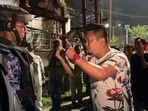 Hundreds of protestors joined a torch rally in Imphal.