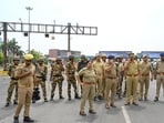 Police stand guard on the DND Flyway in Noida, on Friday. (Sunil Ghosh/HT Photo)