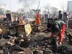 Victims search for their belongings on Thursday. (Deepak Gupta/HT Photo)