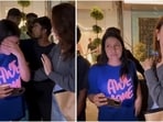 Tamannaah Bhatia supports overwhelmed fan during emotional encounter. Tamannaah Bhatia supports overwhelmed fan during emotional encounter.