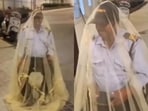 Video of a Hyderabad security guard on duty under a mosquito net went viral. Video of a Hyderabad security guard on duty under a mosquito net went viral.