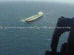 A sailor aboard the USS Michael Murphy (Warship 112) is seen communicating with the “Motor Vessel Molly". A sailor aboard the USS Michael Murphy (Warship 112) is seen communicating with the “Motor Vessel Molly".