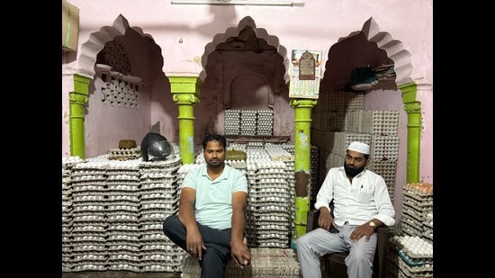 Another room serves as a makeshift living space for the warehouse’s workers.