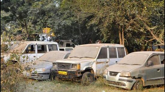 Gurgaon, India- November 24: Abandoned cars at Sector 29 Police Station. Around 3000 vehicles confiscated in various criminal and accident cases by Gurgaon police are ruining under open sky in different police stations of Gurgaon for a long, reveals an RTI reply. These vehicles have not been auctioned, and the police says that some of these would be auctioned soon, in Gurgaon, India, on Tuesday, November 24, 2015. (Photo by Abhinav Saha/Hindustan Times)
