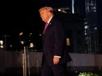 U.S. President Donald Trump walks after exiting Marine One on the South Lawn while returning to the White House in Washington.