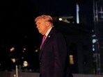 U.S. President Donald Trump walks after exiting Marine One on the South Lawn while returning to the White House in Washington.