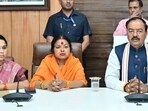 Uttar Pradesh deputy CM Keshav Prasad Maurya with BJP workers and office-bearers in Prayagraj on April 18. (HT photo)