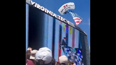Skydiver rescued within minutes after dramatic pre-game incident where a parachuter struck the scoreboard before the Virginia Tech Spring Football Game (X\@KristinThorne) Skydiver rescued within minutes after dramatic pre-game incident where a parachuter struck the scoreboard before the Virginia Tech Spring Football Game (X\@KristinThorne)