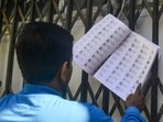 A voter checks his name from West Bengal's draft electoral rolls following special intensive revision (SIR), in Siliguri, West Bengal (PTI FILE PHOTO)