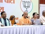 Chief minister Yogi Adityanath addressing a press conference in Lucknow on Sunday. Uttar Pradesh BJP chief Pankaj Chaudhary and SBSP chief OP Rajbhar also seen. (Deepak Gupta/ HT)
