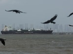 FILE PHOTO: Birds fly near the Jag Vasant vessel transferring LPG at a port after transiting the Strait of Hormuz amid supply disruptions linked to the U.S-Israeli conflict with Iran (REUTERS)