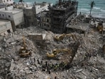 Excavators remove rubble from buildings destroyed in Israeli airstrikes on Thursday as rescuers search for victims in the city of Tyre, southern Lebanon, Saturday, April 18, 2026. Excavators remove rubble from buildings destroyed in Israeli airstrikes on Thursday as rescuers search for victims in the city of Tyre, southern Lebanon, Saturday, April 18, 2026.
