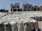 Sacks of wheat at the Karnal grain market on Saturday. (HT Photo)